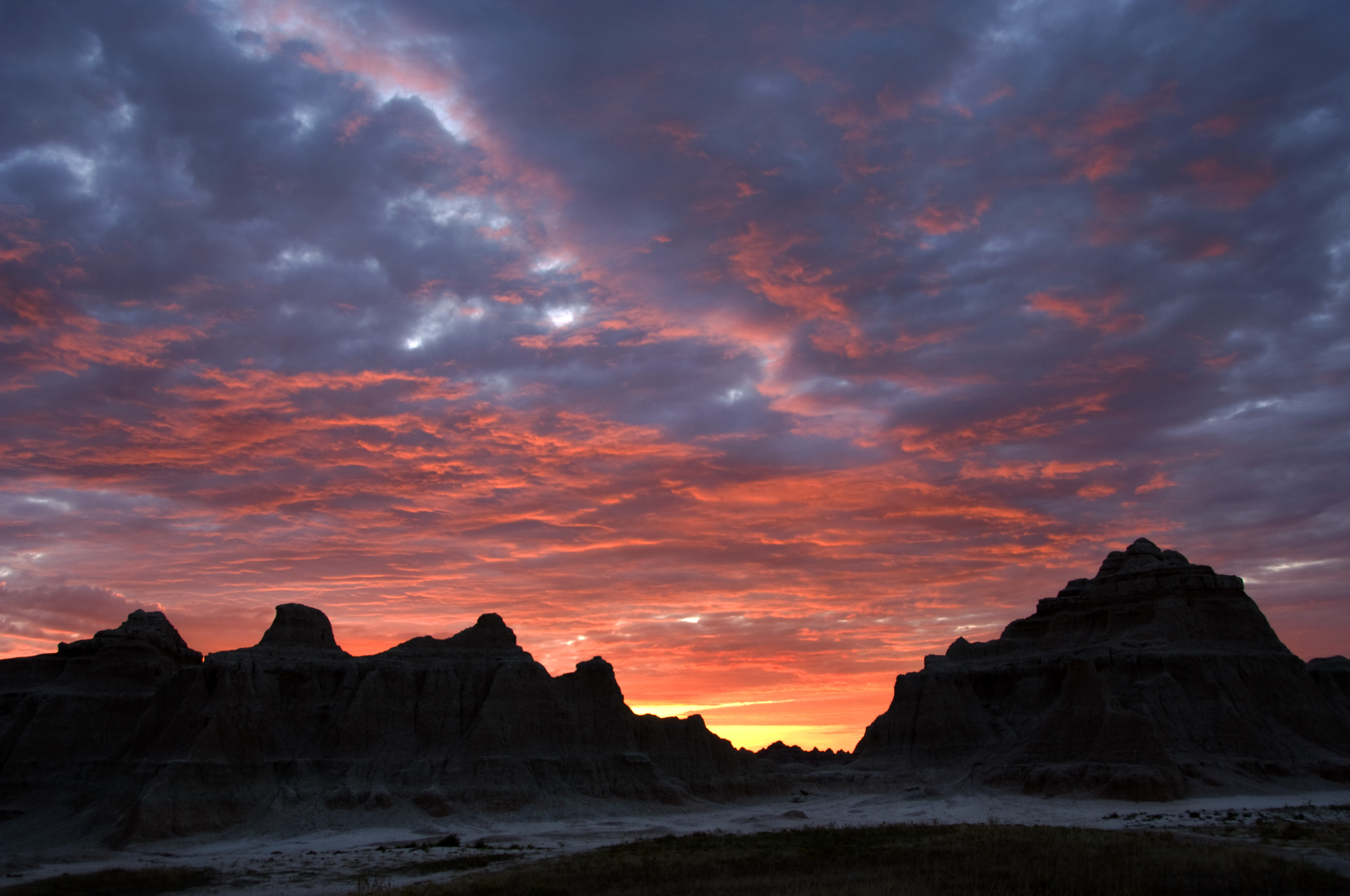 Colorful Sunrise Over a Ridgeline in Badlands National Park 